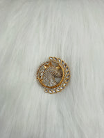 Golden metal and stonework horse brooch with intricate design, featuring a detailed horse figure and elegant craftsmanship.