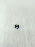 Crochet handwork Nevi blue button by Lace Hut, showcasing intricate crochet detail and a stylish blue button.