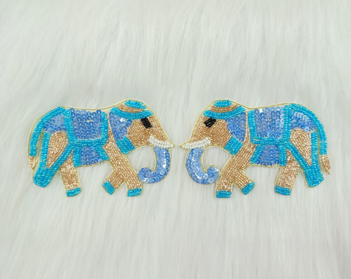 Blue Zardosi poth and sequence handwork elephant patch embroidery from Lace Hut, detailed with intricate gold and blue threadwork.