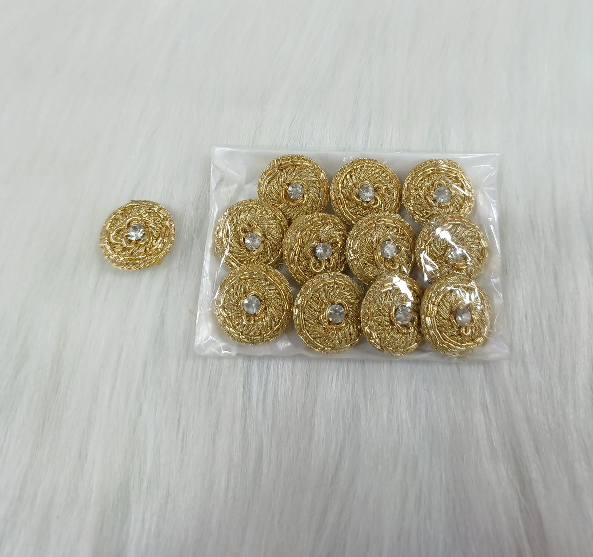 Golden Zardosi and jari handwork button from Lace Hut featuring intricate embroidery and a polished golden finish.