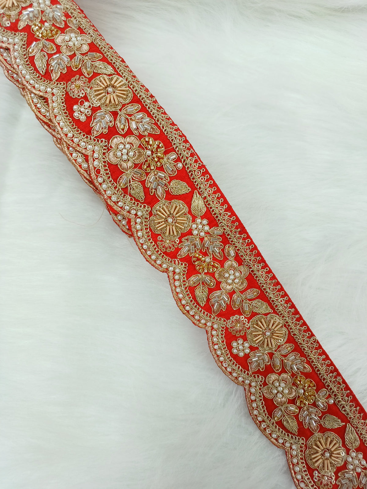 Intricate Rad lace with Cutdana, moti, and zardosi handwork in gold and silver tones, featuring detailed embroidery and embellishments.