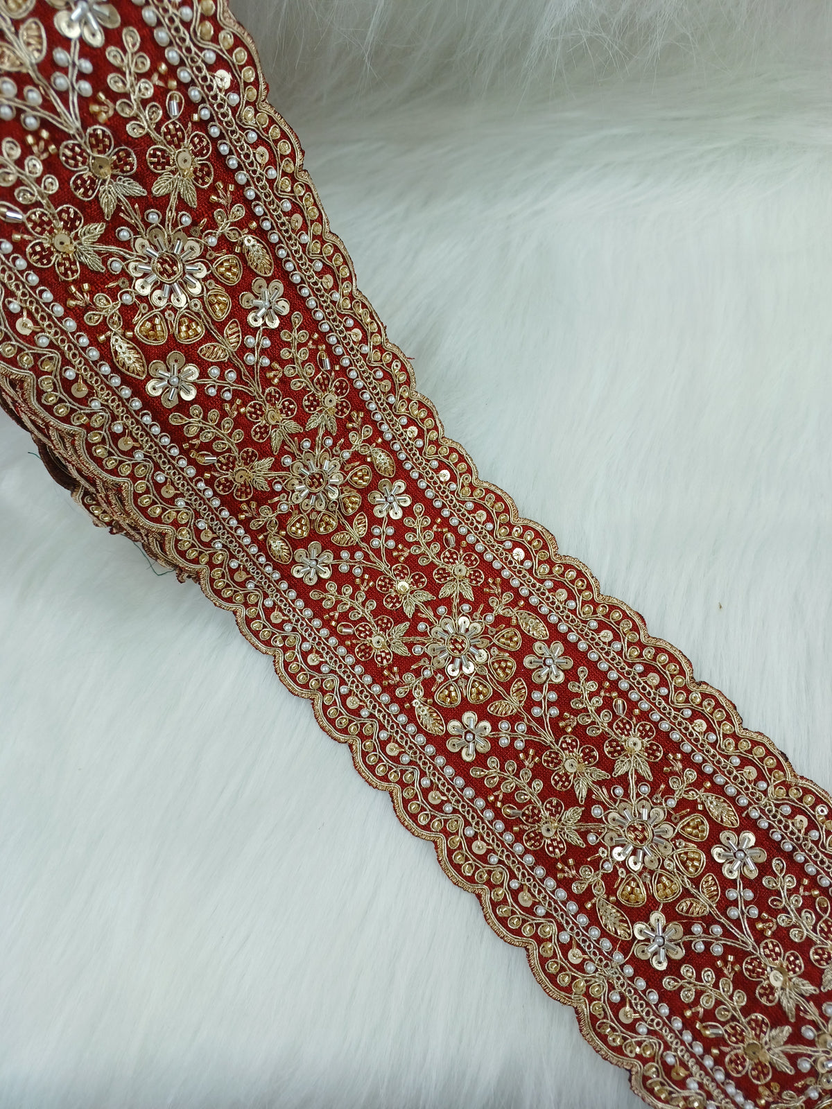 Intricate cutdana moti handwork Marun lace from Lauce-Hut featuring detailed bead and thread embroidery on fine fabric.