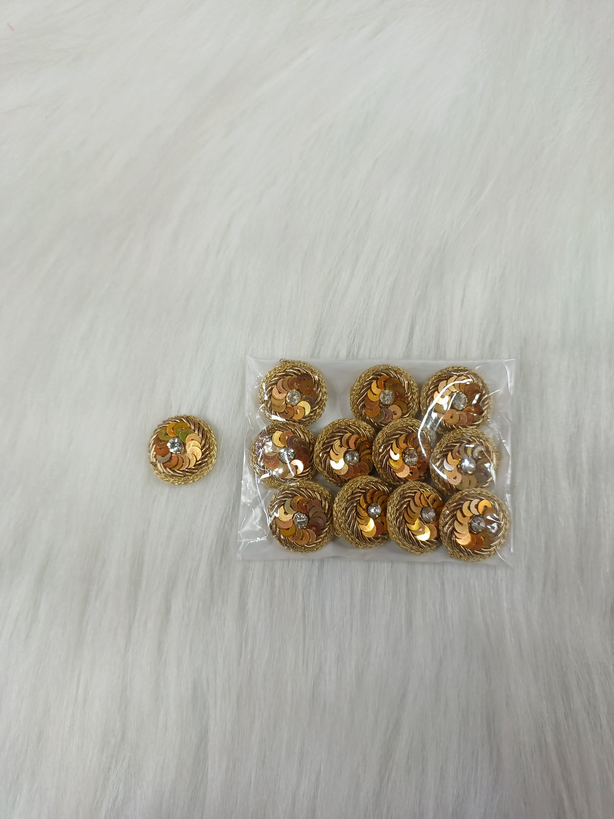 Copper gold Zardosi and sequence handwork button with intricate embroidery, designed by Lace Hut for decorative use.