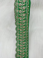 Green lace with cutdana and jari handwork from Lauce-Hut, showcasing intricate floral embroidery and detailed craftsmanship.