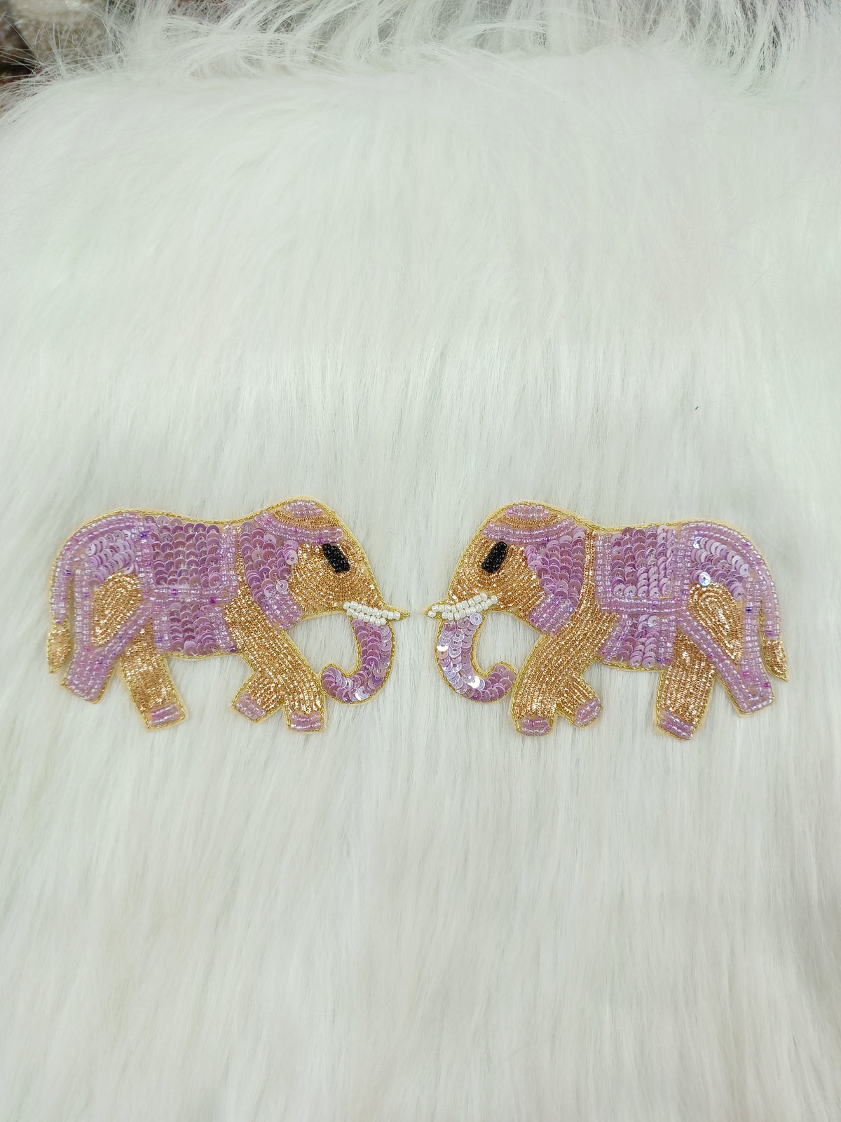 Lavender elephant patch with Zardosi, poth, and sequence handwork from Lace Hut, featuring intricate embroidery and decorative details.