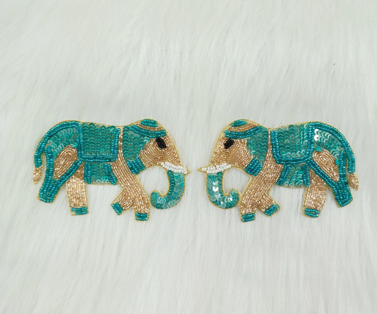 Green Rama Zardosi poth and sequence handwork patch with elephant design from Lace Hut, showcasing intricate embroidery on fabric.