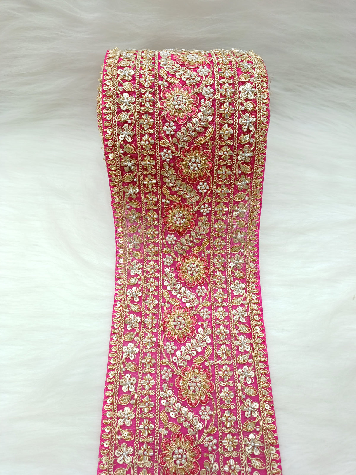 Rani pink lace with cutdana and moti handwork on net base, detailed embroidery by Lace Hut