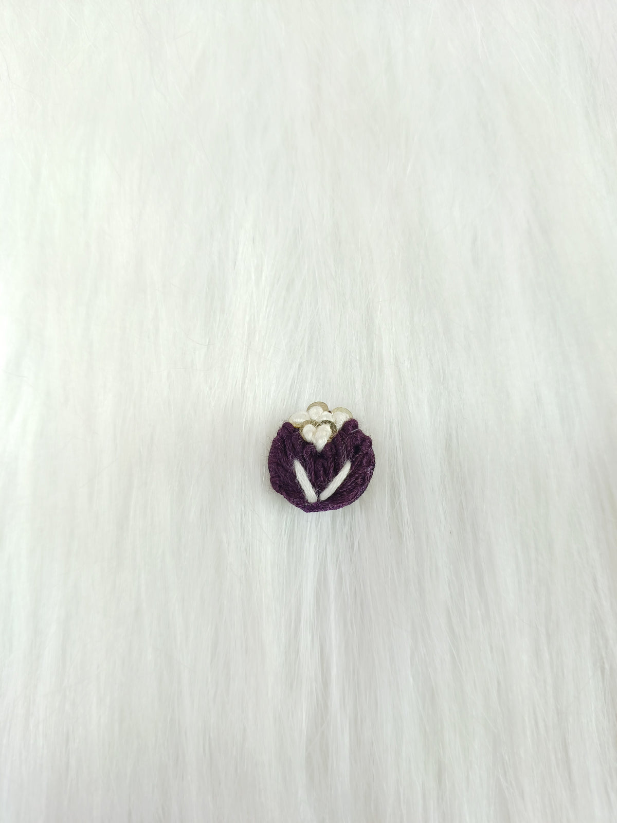 Crochet lace vine button by Lace Hut, handcrafted with intricate crochet design, ideal for decorative sewing or craft projects.
