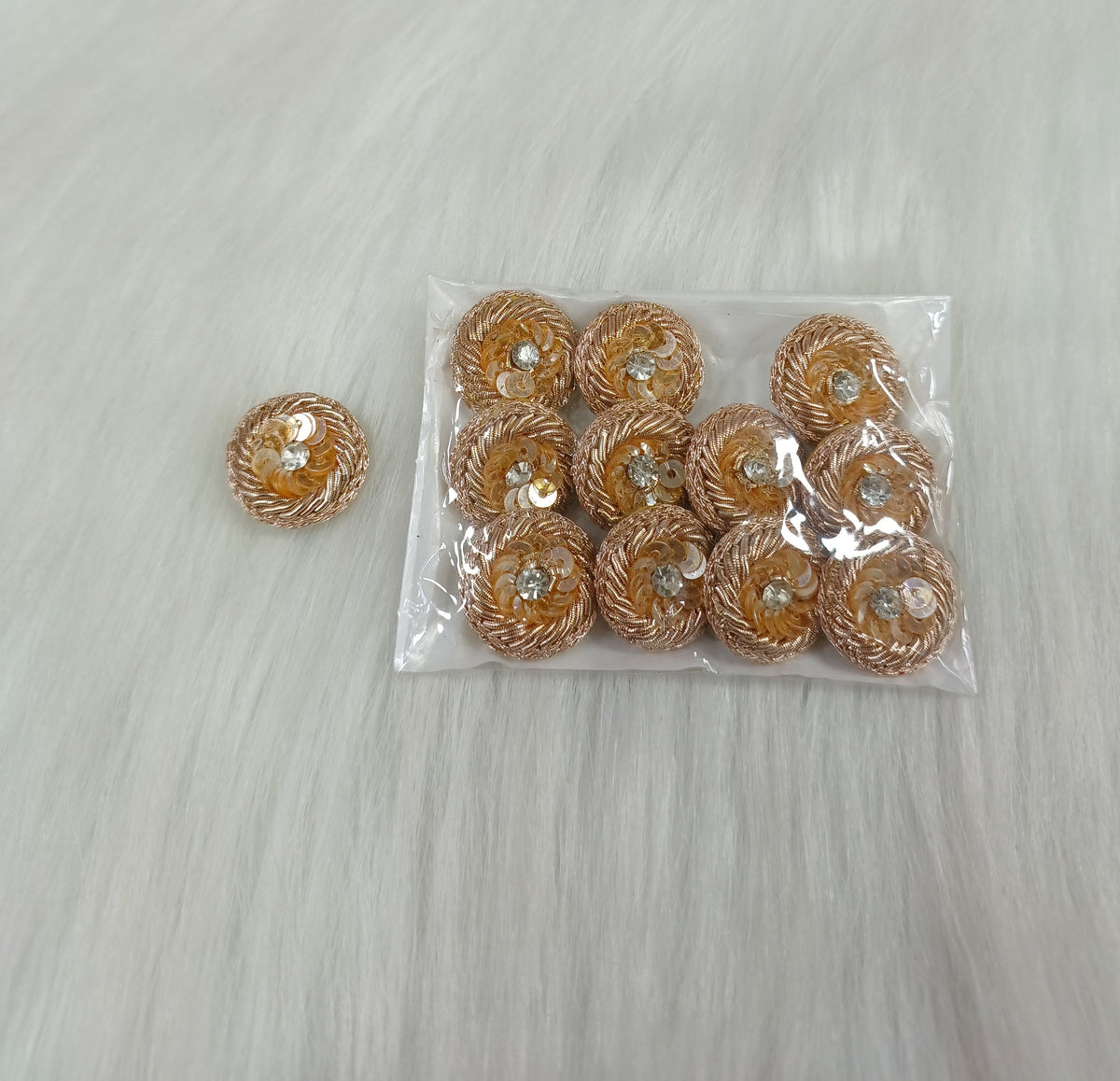 Rose gold Zardosi and sequence handwork button with intricate embroidery, ideal for traditional or ethnic clothing.