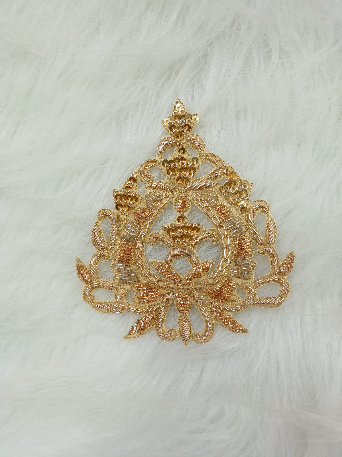 Intricate Zardosi handwork rose gold patch with detailed embroidery, perfect for embellishing fabrics or accessories.
