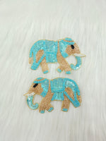 Aqua blue Zardosi poth and sequence handwork elephant patch from Lace Hut, detailed embroidery on fabric.