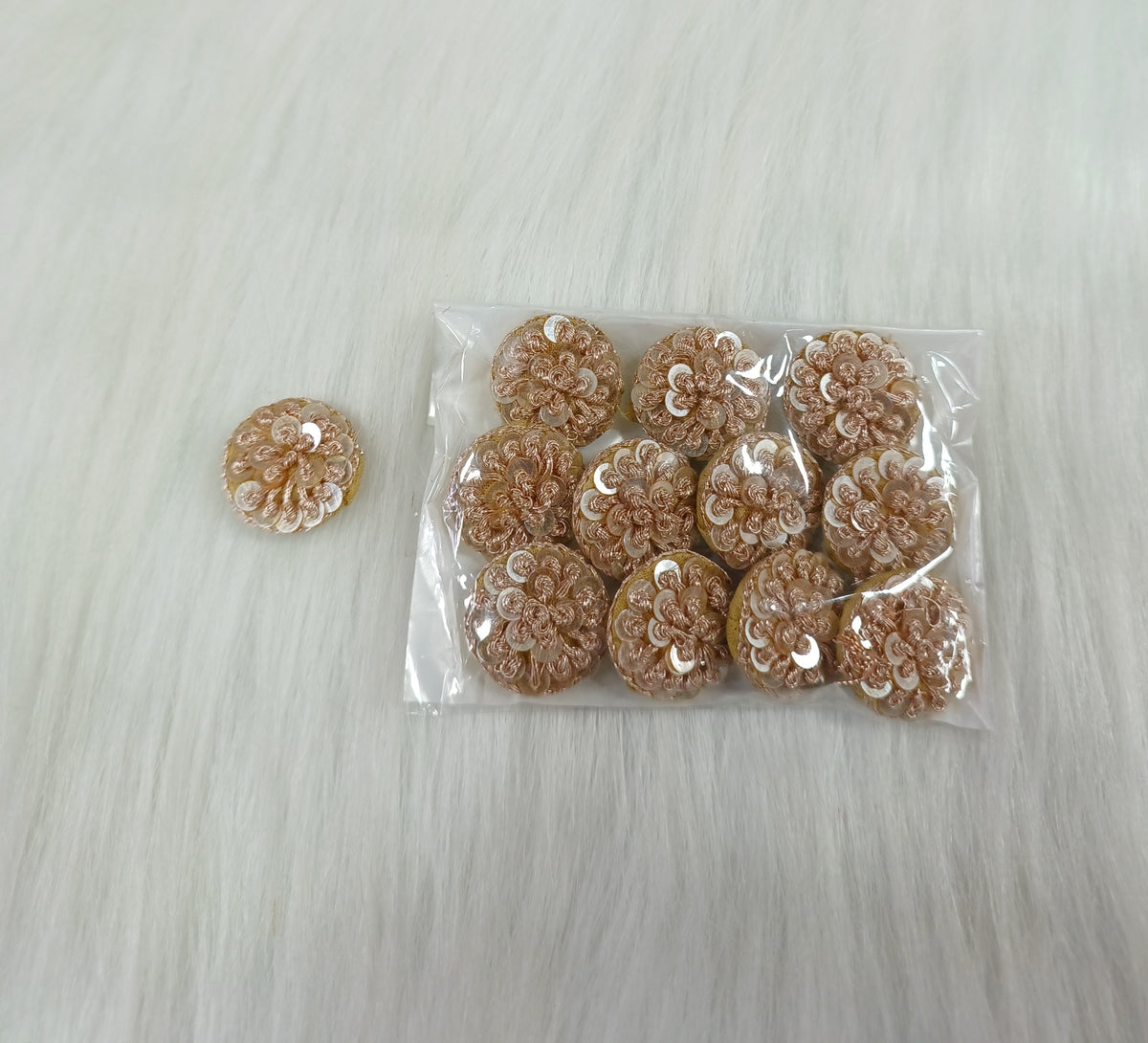 Rose gold button with jari and sequins from Lace Hut, featuring a stylish design and decorative embellishments.