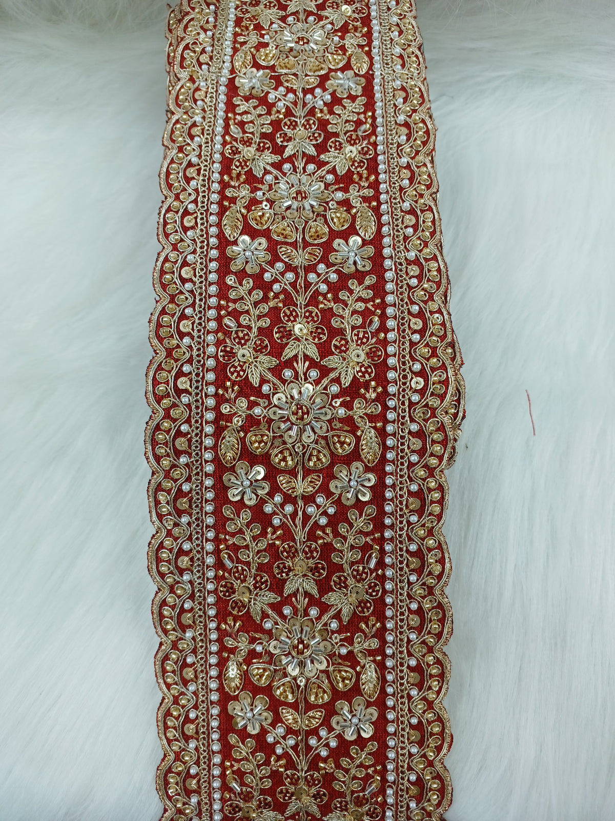 Elegant close-up of lauce-hut Cutdana Moti Handwork Marun lace with intricate embroidery and bead detailing.