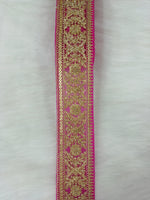 Magenta pink lace Jari work net base fabric by Lace Hut, showing intricate floral patterns and delicate embroidery details.