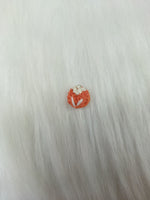 Crochet handwork peach button from Lace Hut featuring intricate design, perfect for adding a handmade touch to garments.