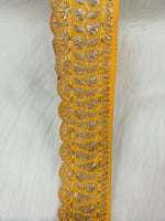 Yellow lace with intricate Cutdana and jari handwork, detailed floral pattern, crafted by Lauce-Hut.