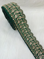 Bottle green lace with intricate cutdana jariwork from Lauce-Hut, showcasing detailed embroidery on fine fabric.