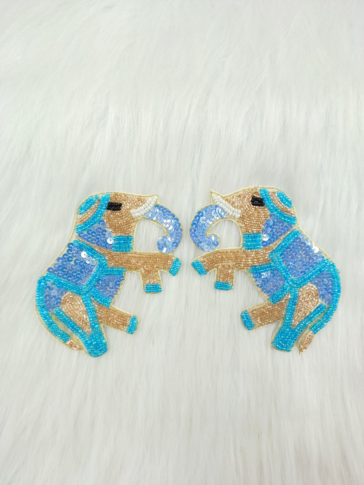 Blue Zardosi poth and sequence handwork elephant patch from Lace Hut, showcasing intricate embroidery on fabric.