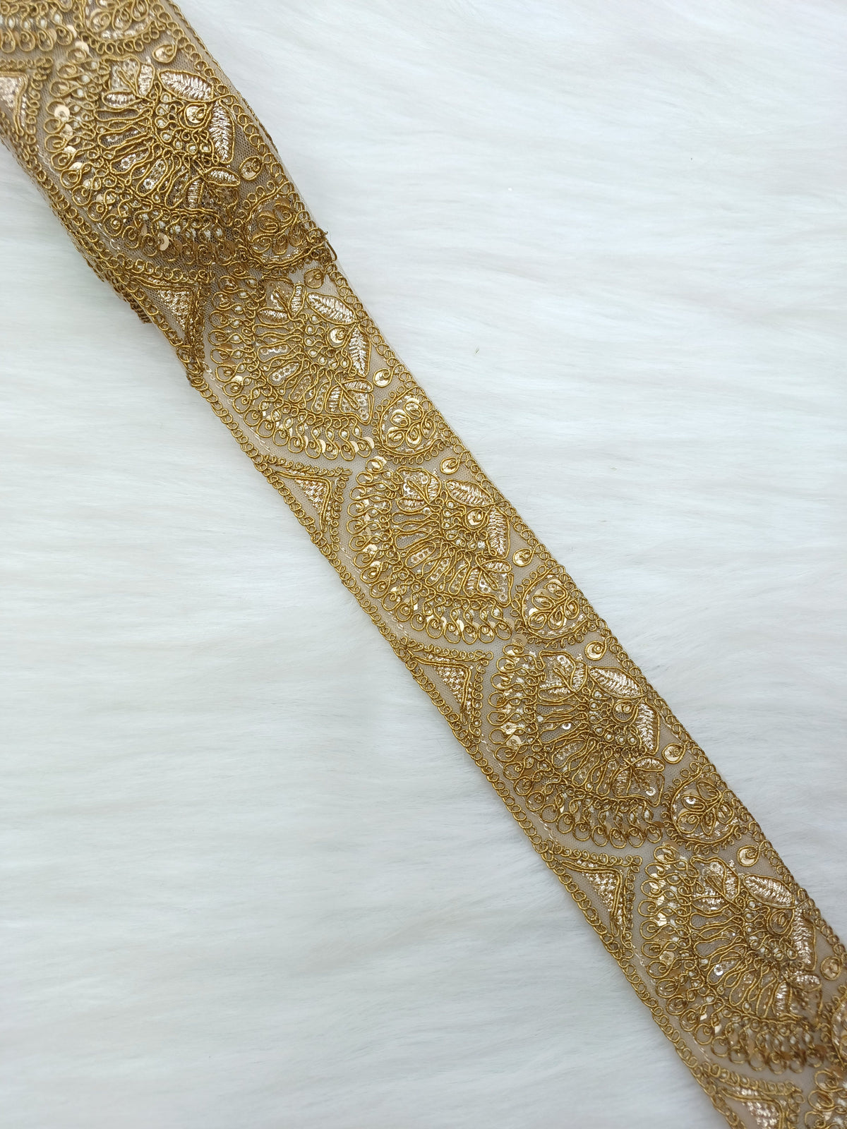 Antique gold lace fabric with intricate floral patterns, suitable for jewelry or clothing designs, from Lace Hut's Jari Work collection.