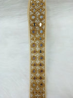 Antique golden cutdana handwork plastic mirror lace featuring intricate design, perfect for traditional decor and craft projects.