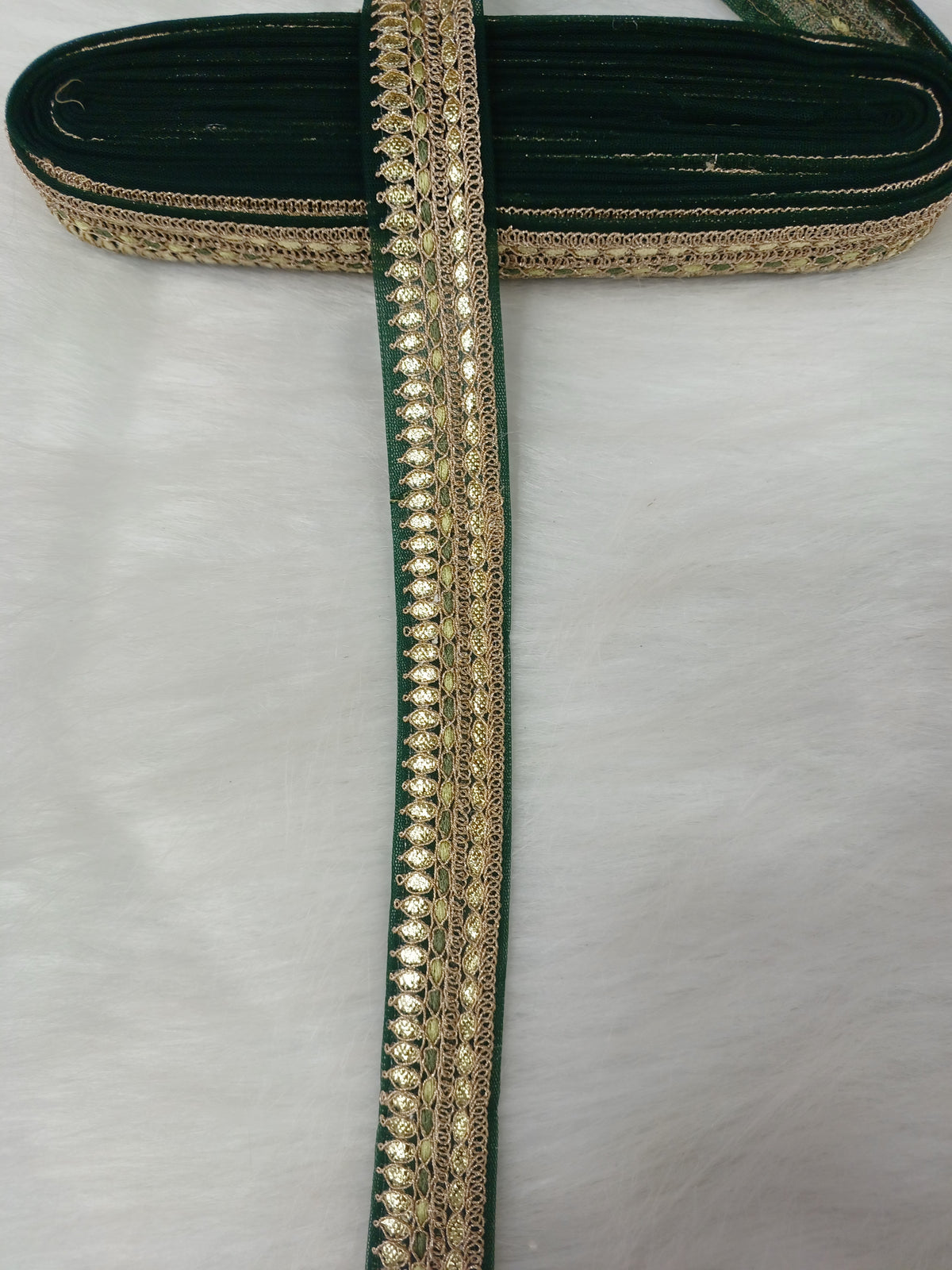 Bottle green lace with intricate Gota Patti work, showcasing detailed embroidery and delicate craftsmanship from Lace Hut.