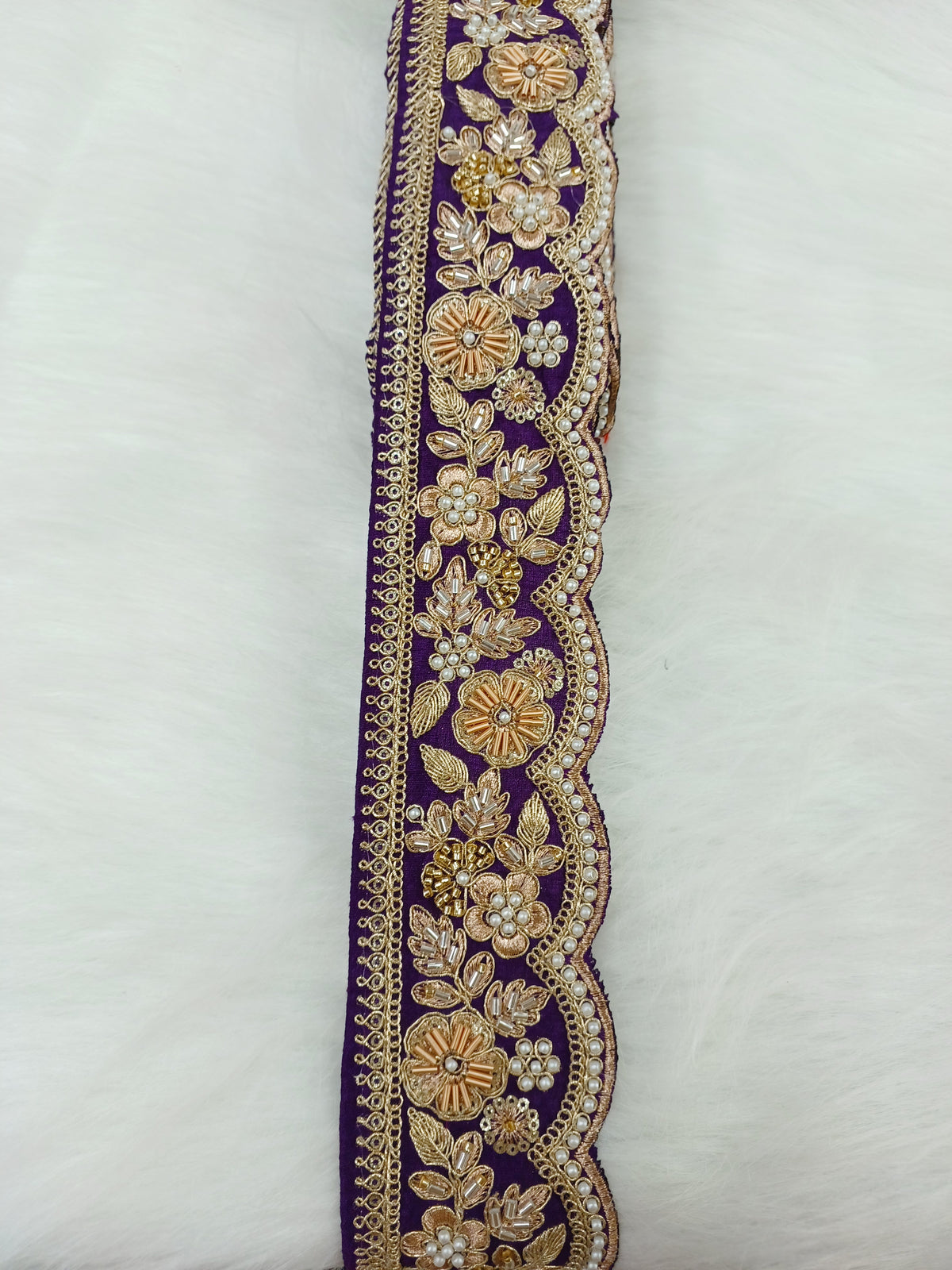 Purple lace with cutdana, moti, and zardosi handwork, featuring intricate embroidery from Lauce-Hut.