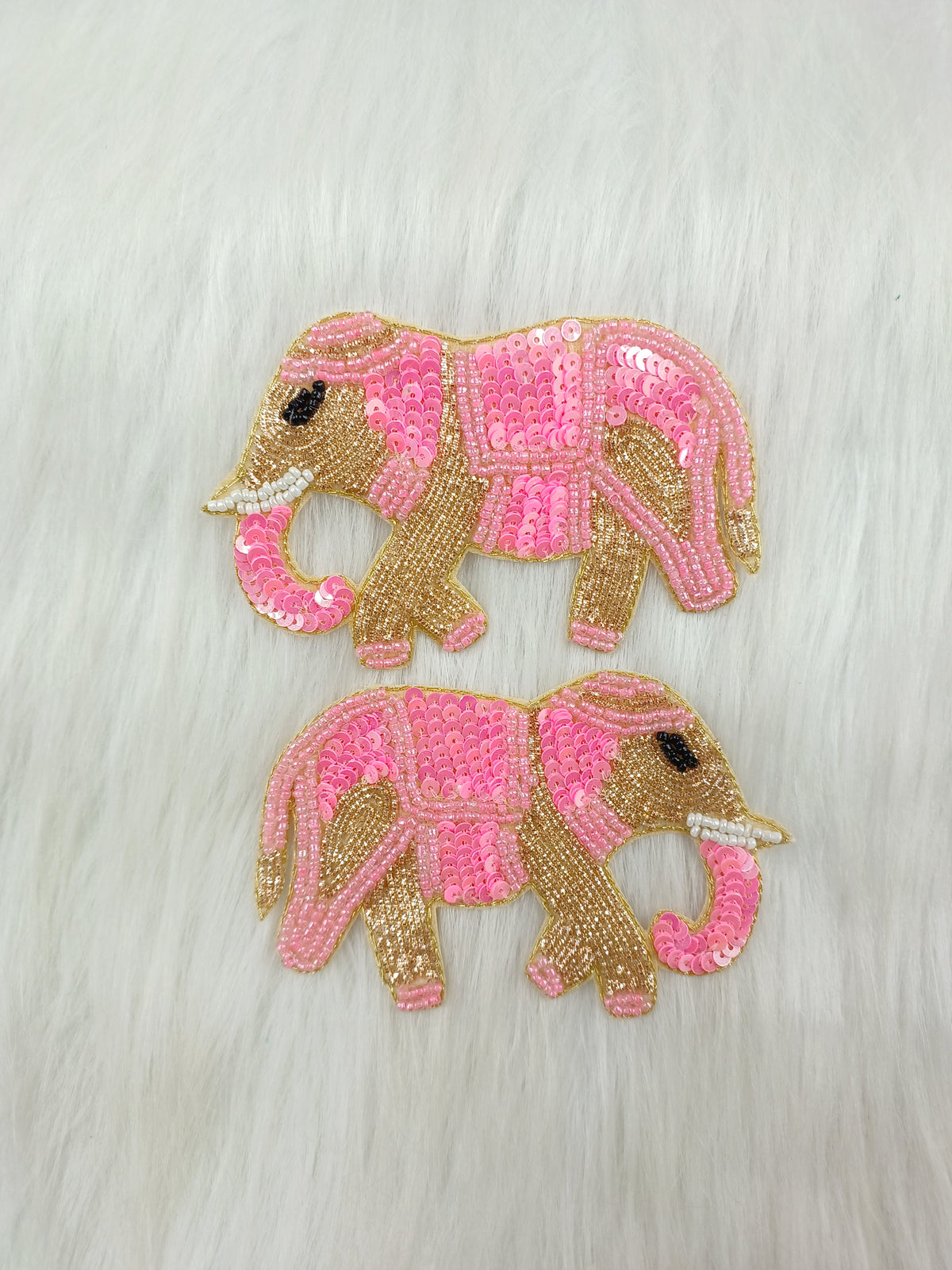 Pink elephant patch with Zardosi embroidery and sequin handwork, crafted by Lace Hut, featuring intricate decorative details.