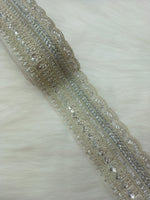 Silver lace with intricate cutdana handwork from Lace Hut, showcasing detailed embroidery and delicate craftsmanship.